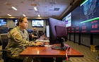 U.S. Army Staff Sgt. Josephine Danielson, assigned to Joint Task Force Civil Support, sits at her assigned position in a newly-renovated joint operations center at JTF-CS headquarters on Fort Eustis, Virginia, Nov. 28, 2022.