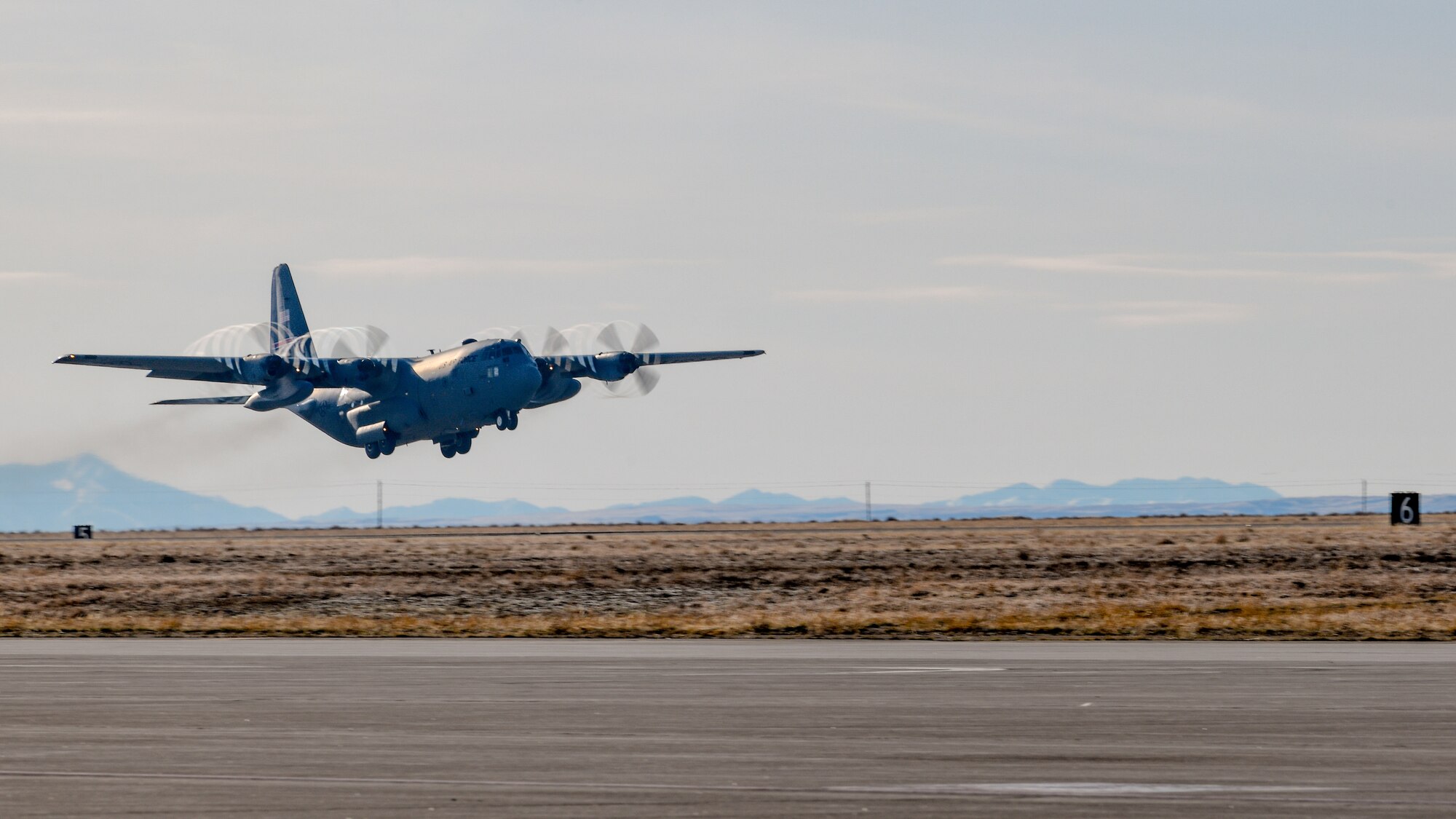 A 910th Airlift WingC-130H Hercules, assigned to Youngstown Air Reserve Station, Ohio, takes off from Mountain Home Air Force Base, Idaho, on Jan. 18, 2023.