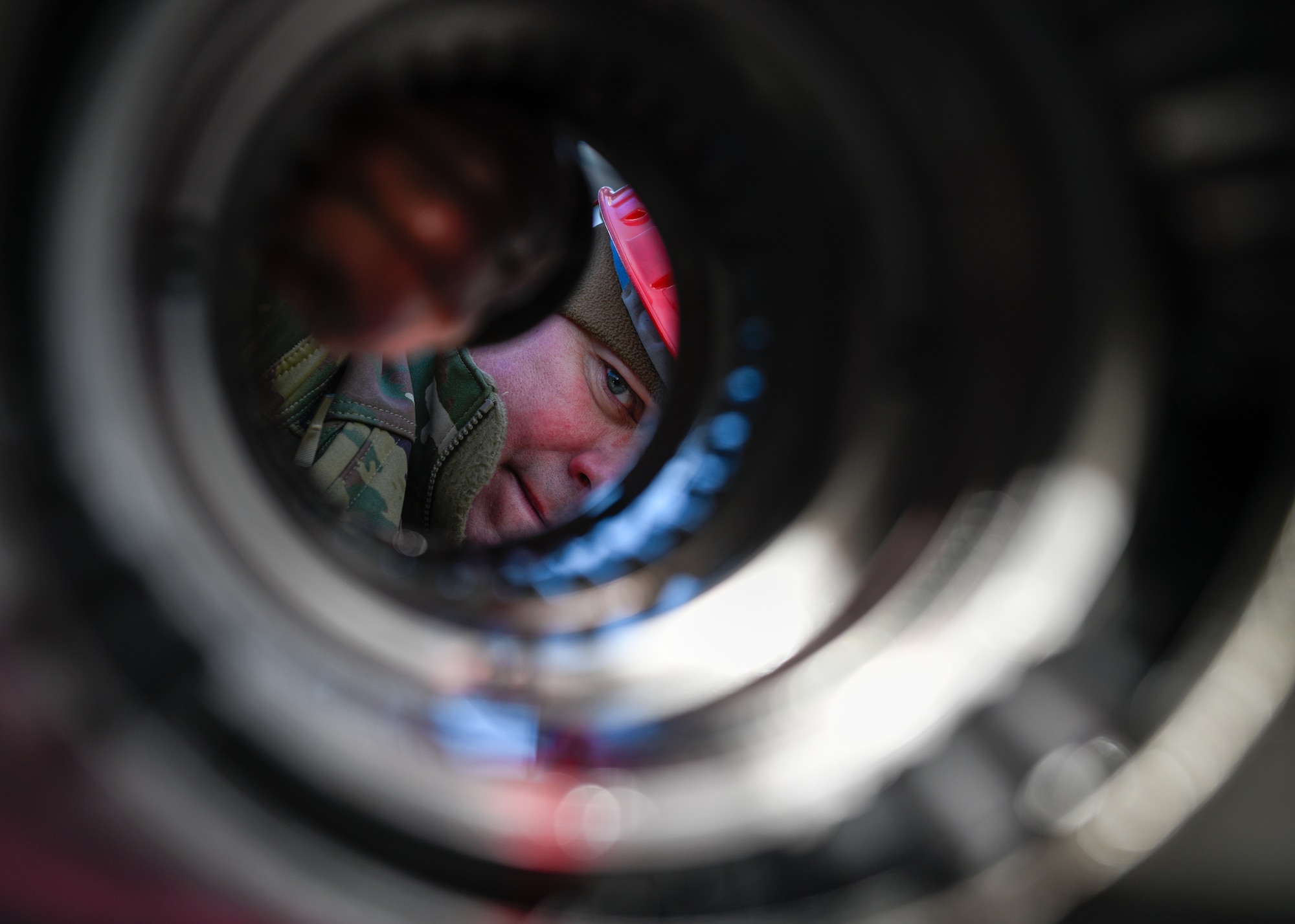 Tech. Sgt. Steven Lew, an aerospace propulsion technician assigned to the 910th Aircraft Maintenance Squadron, inspects a C-130H Hercules aircraft propeller, Jan. 17, 2023, at Mountain Home Air Force Base, Idaho.