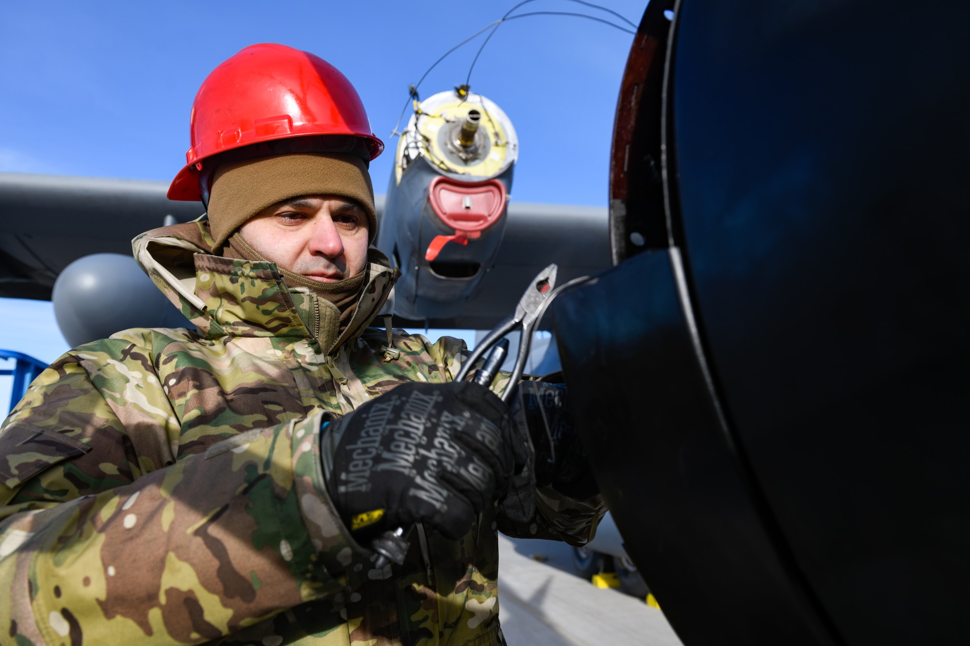 Master Sgt. Florin Gargarita, an aerospace propulsion technician with the 910th Aircraft Maintenance Squadron, prepares a propeller for installation onto a 910th Airlift Wing C-130H Hercules aircraft, Jan. 17, 2023, at Mountain Home Air Force Base, Idaho.