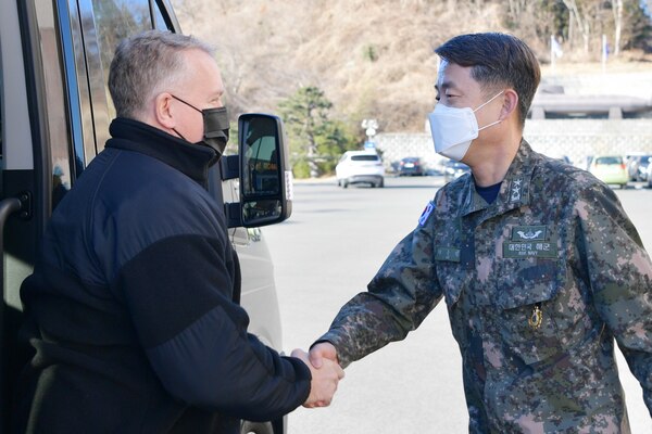 CHINHAE, Republic of Korea (Jan. 25, 2023) Rear Adm. Rick Seif, commander, Submarine Group 7, left, greets Republic of Korea (ROK) Navy Rear Adm. Suyoul Lee, commander, ROK Navy Submarine Force, after arriving at Submarine Force Command (CSF) in Chinhae, Republic of Korea, Jan. 25. CSG 7 directs forward-deployed combat-capable forces across the full spectrum of undersea warfare throughout the Western Pacific, Indian Ocean and Arabian Sea. (Photo courtesy of ROK Navy Public Affairs)