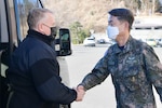 Rear Adm. Rick Seif, commander, Submarine Group 7, left, greets Republic of Korea (ROK) Navy Rear Adm. Suyoul Lee, commander, ROK Navy Submarine Force, after arriving at Submarine Force Command (CSF) in Chinhae, Republic of Korea, Jan. 25. CSG 7 directs forward-deployed combat-capable forces across the full spectrum of undersea warfare throughout the Western Pacific, Indian Ocean and Arabian Sea.
