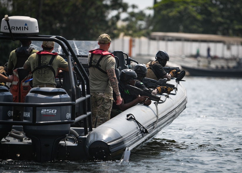 230125-N-DK722-1009 (Jan. 25, 2023) LAGOS, Nigeria – Nigerian Navy and Police Force personnel, alongside U.S. Coast Guard and U.S. Army personnel from Law Enforcement Detachment 403, conduct Visit, Board, Search and Seizure training during Obangame Express 2023, in Lagos, Nigeria, Jan. 25, 2023. Obangame Express 2023, conducted by U.S. Naval Forces Africa, is a maritime exercise designed to improve cooperation, and increase maritime safety and security among participating nations in the Gulf of Guinea and Southern Atlantic Ocean. U.S. Sixth Fleet, headquartered in Naples, Italy, conducts the full spectrum of joint and naval operations, often in concert with allied and interagency partners, in order to advance U.S. national interests and security and stability in Europe and Africa. (U.S. Navy photo by Mass Communication Specialist 1st class Cameron C. Edy)