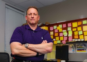 Gilbert Williams, Submarine Force Atlantic’s force manning officer, poses for a photo in his office after being recognized as the command’s 2022 Civilian of the Year.