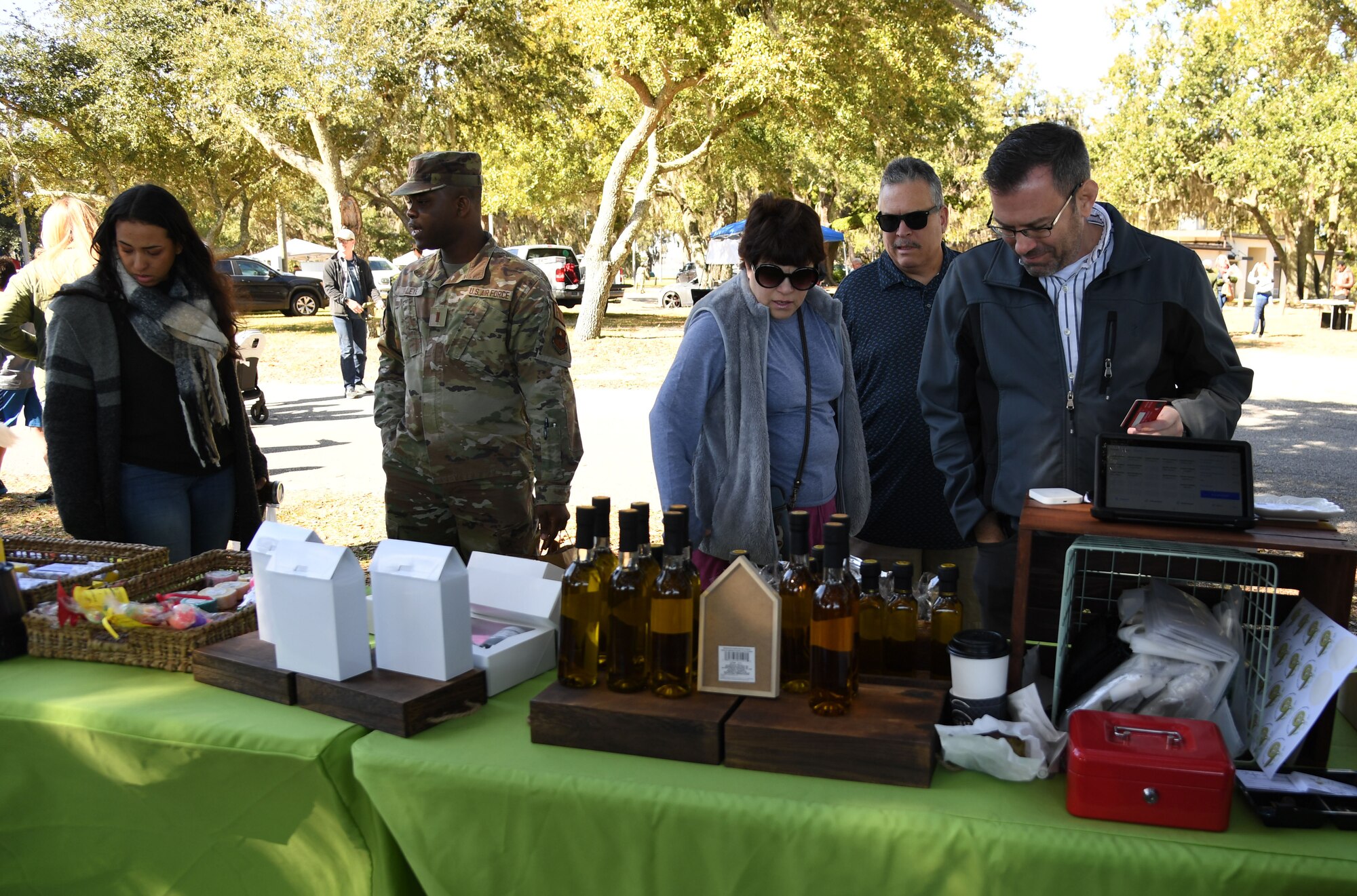 Keesler personnel and family members attend the Farmer's Market at the marina park at Keesler Air Force Base, Mississippi, Jan. 27, 2023.