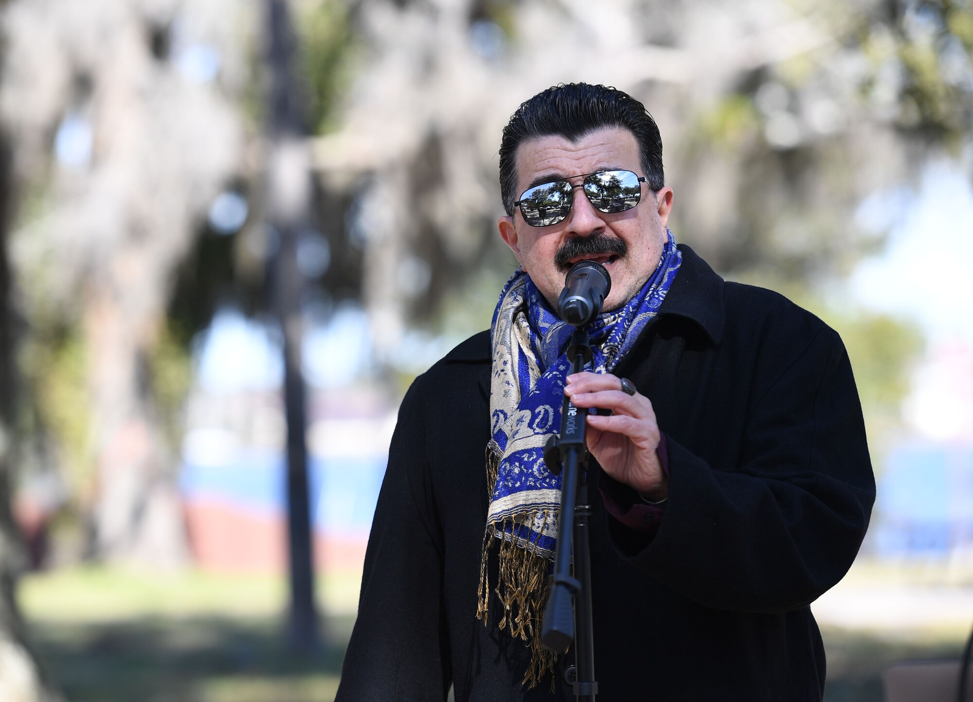U.S. Air Force Major Rico Blue, 81st Training Wing chaplain, performs a song during the Farmer's Market at the marina park at Keesler Air Force Base, Mississippi, Jan. 27, 2023.