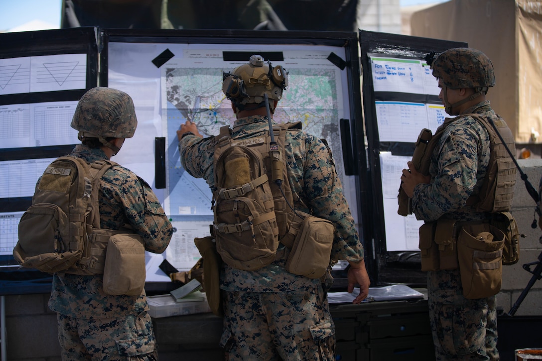 U.S. Marine Staff Sgt. Ryan Metas, a forward observer with 1st Air Naval Gunfire Liaison Company, 1 Marine Expeditionary Force Information Group, prepares to assist in close air support operations on Camp Pendleton, California, Aug. 2, 2022. 1st ANGLICO practices CAS exercises to ensure the Ground Combat Element and the Air Combat Element are in sync and ready to accomplish mission tasking around the world. (U.S. Marine Corps photo by Staff Sgt. David Bickel)