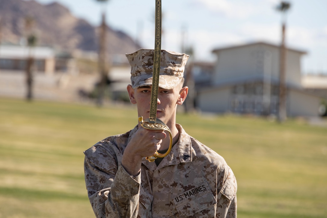 A U.S. Marine Corps Corporal practices sword manual