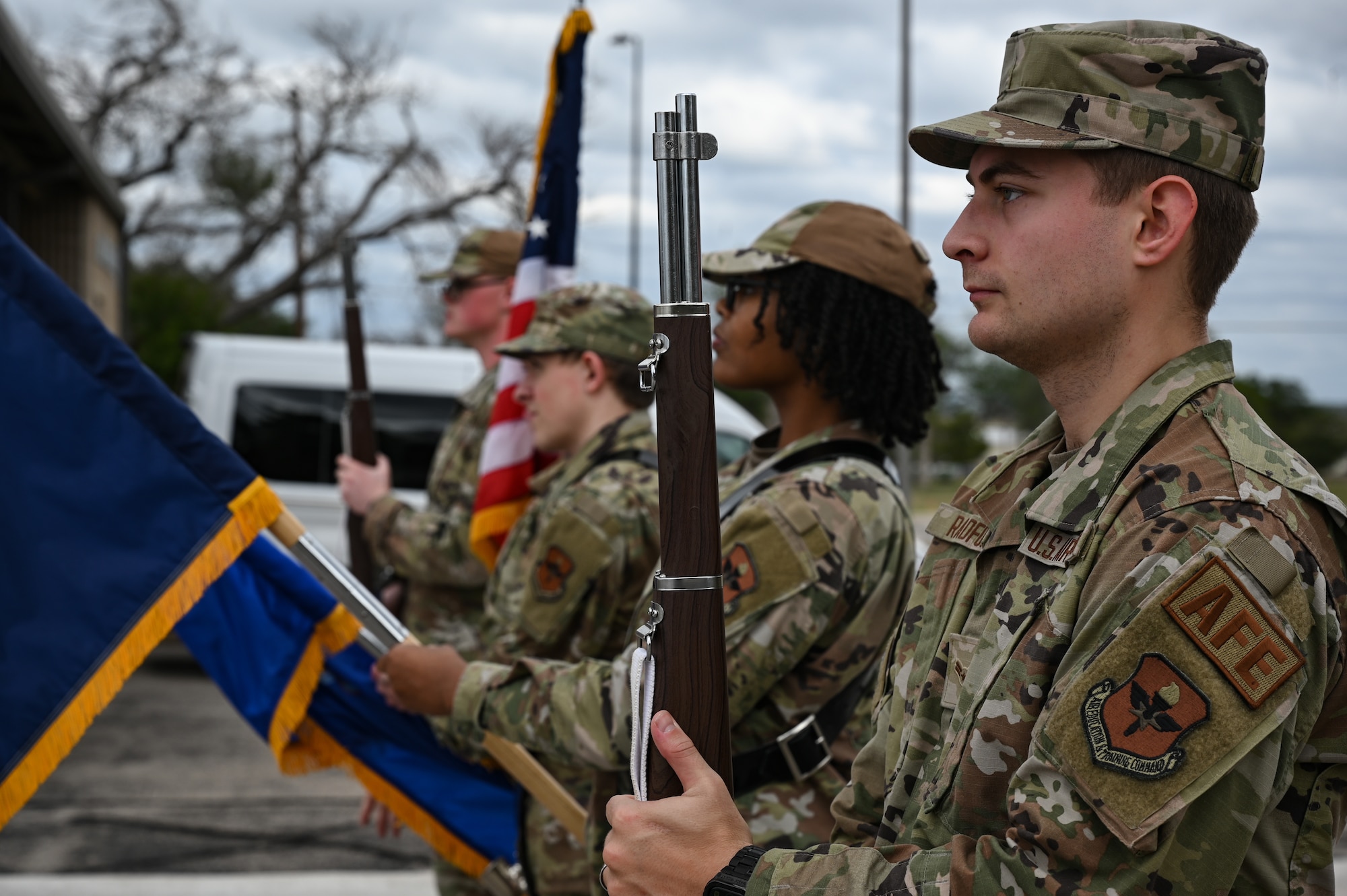 U.S. Air Force Airman 1st Class Devin Radford, 47th Operations Support Squadron aircrew flight equipment specialist, presents a ceremonial M1 Garand rifle during practice at Laughlin Air Force Base, Texas, on Oct. 10, 2022. The rifle is considered a symbol of the unit’s readiness to defend the country and the dedication and commitment of the Air Force to serve and protect the nation. (U.S. Air Force photo by Airman 1st Class Keira Rossman)