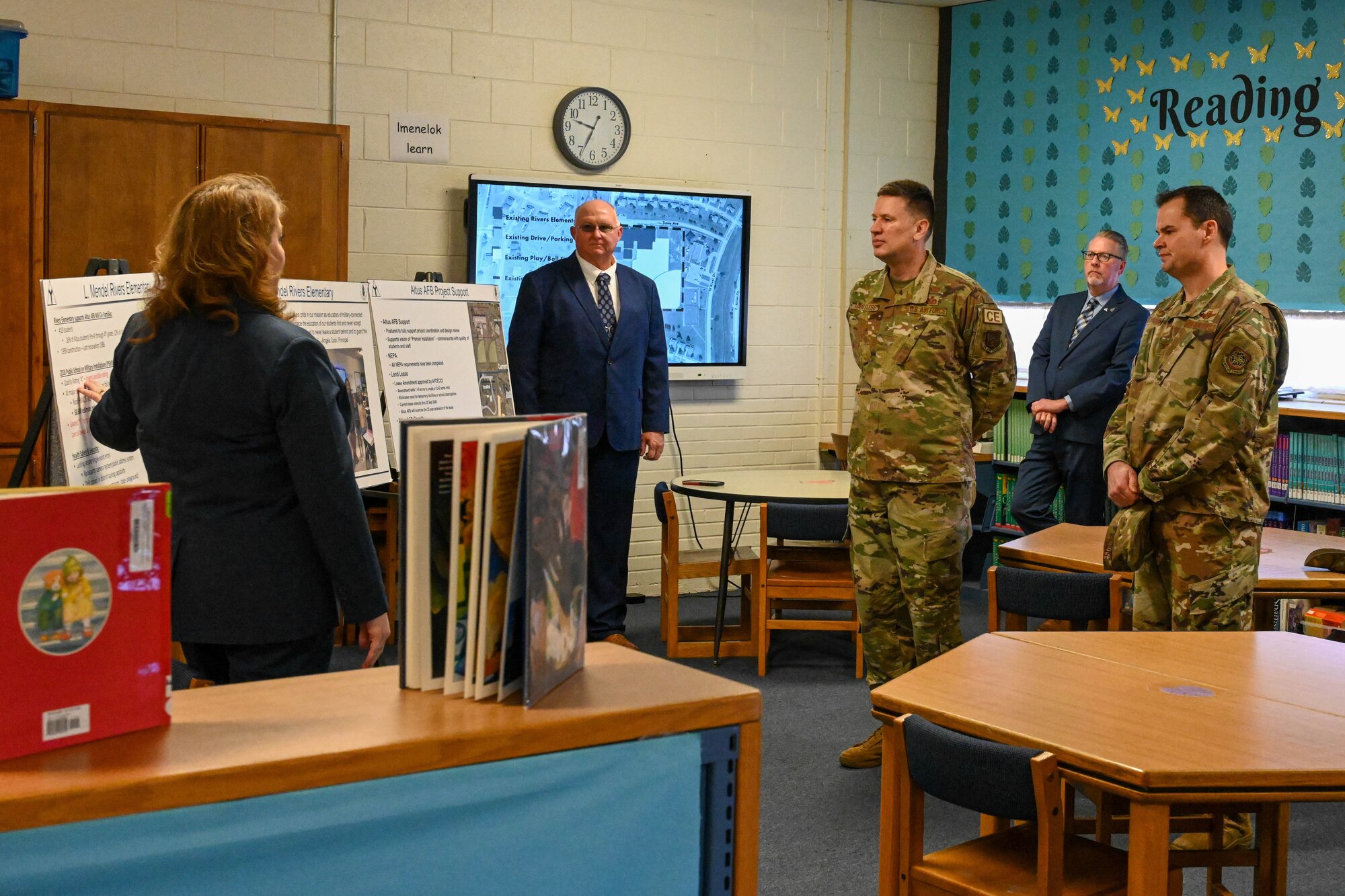 Judy Mott, 97th Force Support Squadron school liaison program manager, talks about L. Mendel Rivers Elementary at Altus Air Force Base, Oklahoma, to U.S. Air Force Brig. Gen. Brian Hartless, Air Force director of engineers, and Col. Chesley Dycus, 92nd Air Refueling Wing commander, Jan. 19, 2023. Oklahoma Senator James Lankford, after personally touring Rivers Elementary, helped secure funding to repair, improve safety, and provide general renovations needed to improve the school's learning environment. (U.S. Air Force photo by Senior Airman Trenton Jancze)