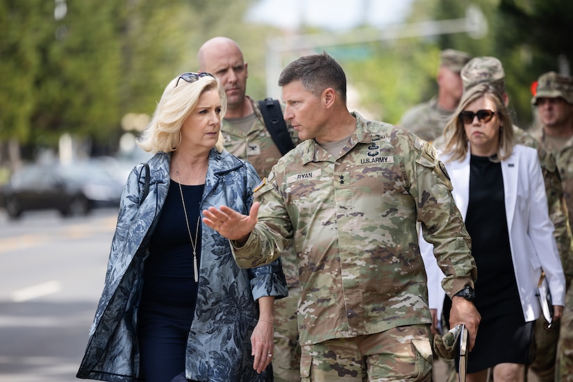 The Honorable Christine E. Wormuth, 25th Secretary of the Army, speaks with Maj. Gen. Joesph Ryan, commanding general of the 25th Infantry Division, during her visit to Schofield Barracks, Hawaii, Jan. 24, 2023. During the visit, she hosted a public town hall, toured barracks rooms on the installation and sat down with Soldiers to get insight into life serving in Hawaii. (U.S. Army photo by Sgt. Rachel Christensen/28th Public Affairs Detachment)