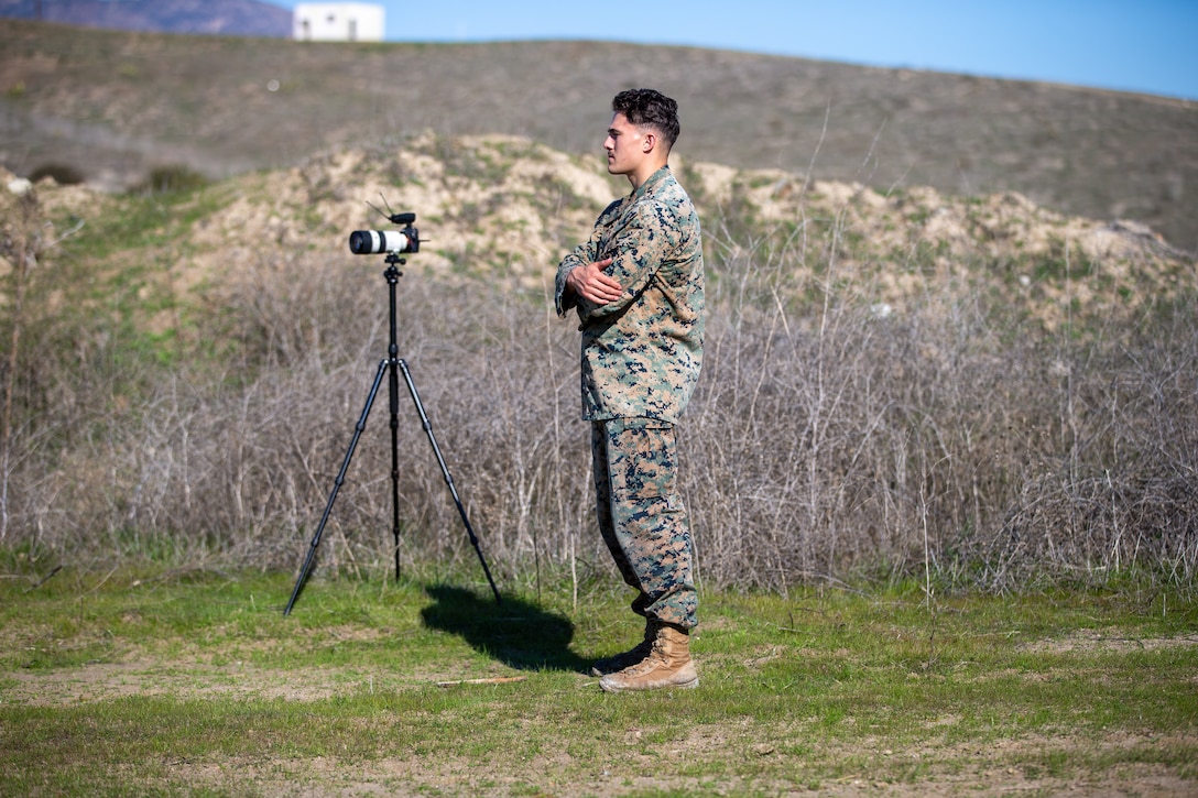 U.S. Marine Corps Cpl. Atticus Martinez, a combat videographer with I Marine Expeditionary Force Information Group, conducts an on-camera interview during a Combat Service Support Company field exercise at Marine Corps Base Camp Pendleton, California, Dec. 14, 2022. CSSC conducted the field exercise to meet operational and training objectives to enhance deployment capabilities and unit readiness. (U.S. Marine Corps photo by Sgt. Alize Sotelo)
