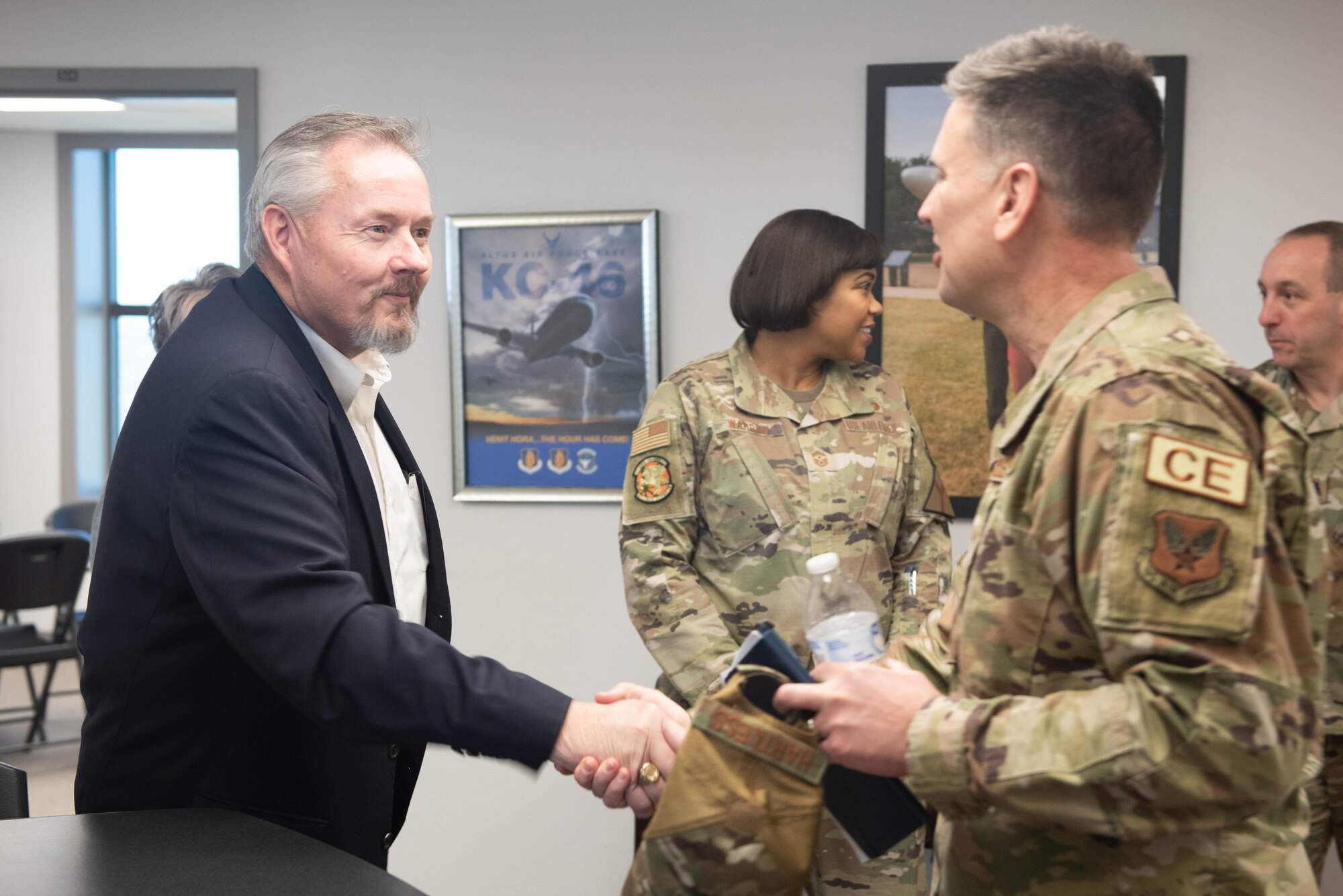 Rodger Kerr, Altus Chamber of Commerce president and CEO, meets U.S. Air Force Brig. Gen. Brian Hartless, Air Force director of engineers, at the military spouse coworking space at Altus, Oklahoma, Jan. 20, 2023. Base and community leaders worked together to create the spouse coworking space in June 2021 to provide a dedicated place for military spouses to mingle with the local community, network with local employers, and focus on their careers. (U.S. Air Force photo by 2nd Lt. Charlie Nichols)
