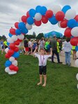 Reeve completes a 2022 summer triathlon. Reeve was assisted by Lt. Col. Cassandra Burns, 88th Medical Group pediatric neurologist, after being diagnosed with a rare case of cerebral folate deficiency at four years old, along with being diagnosed with down syndrome at birth. (Courtesy Photo)