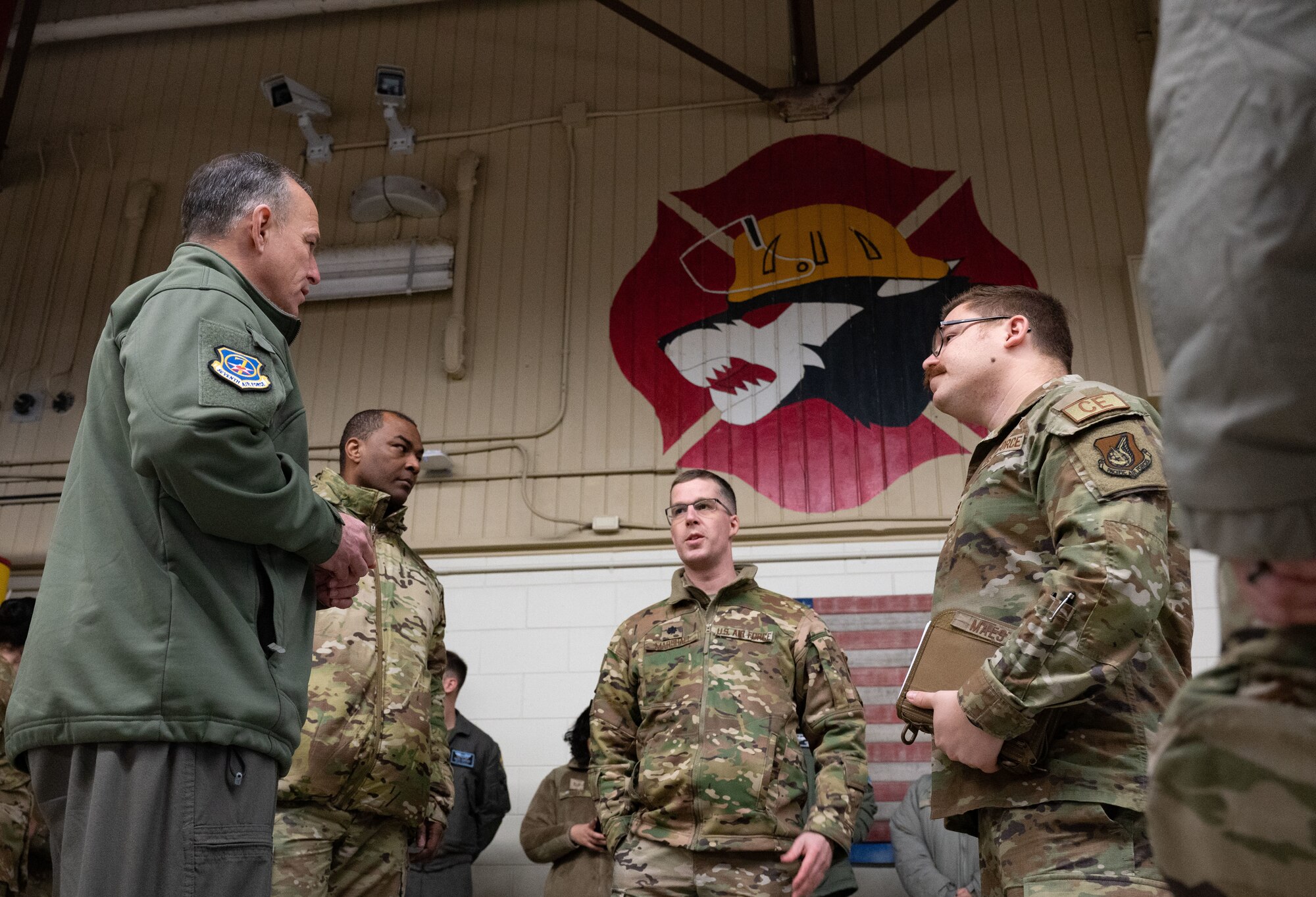 U.S. Air Force Lt. Gen. Scott L. Pleus (left), 7th Air Force commander and Chief Master Sgt. Alvin R. Dyer (center left), 7th AF command chief, talk with 8th Mission Support Group and 8th Civil Engineer Squadron leaders, at Kunsan Air Base, Republic of Korea, Jan. 25, 2023. Gen. Pleus conducted battlefield circulation tours to better understand the Wolf Pack’s needs so Airmen can continue supporting a free and open Indo-Pacific region. (U.S. Air Force photo by Staff Sgt. Sadie Colbert)