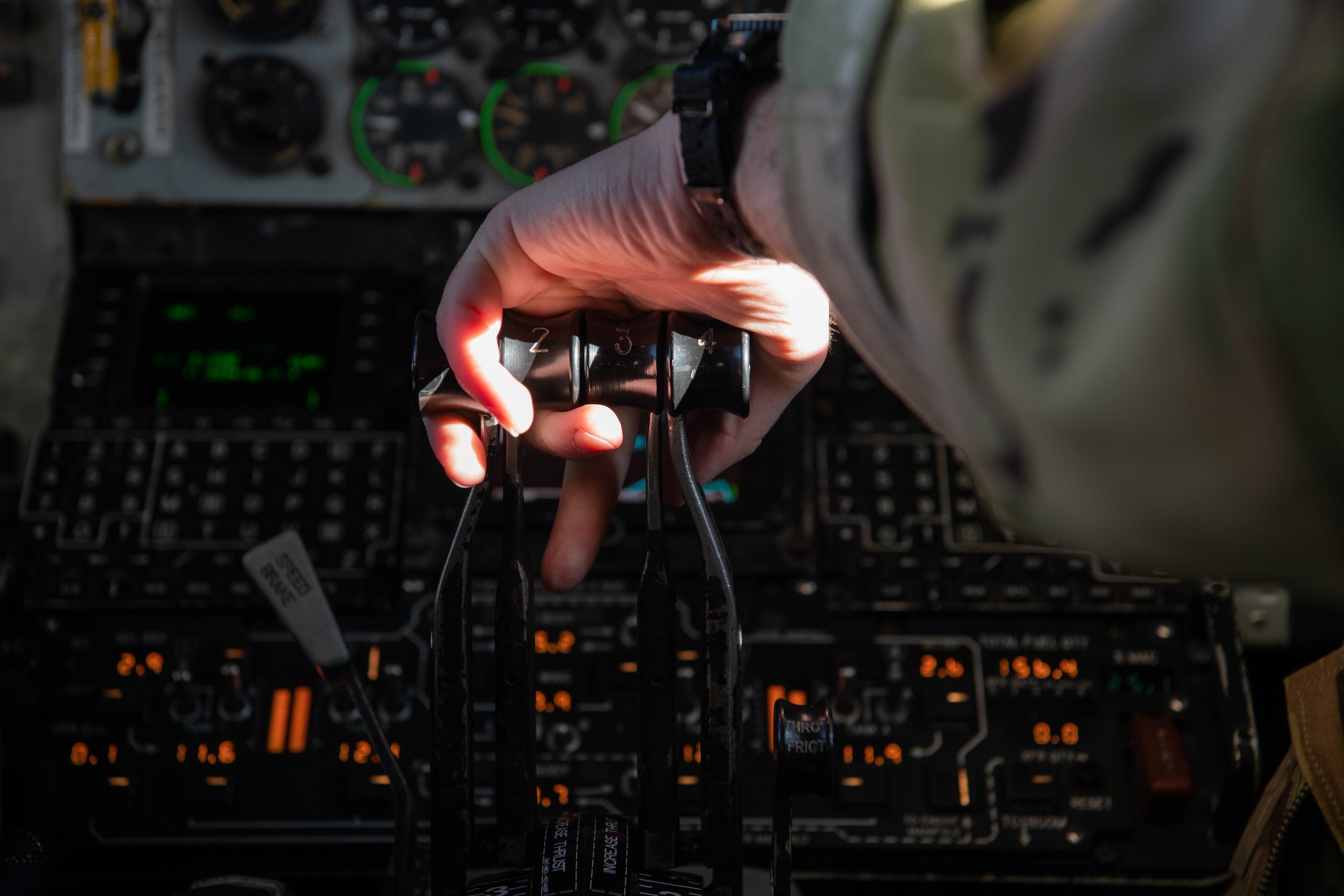 An Airman controls an aircraft's engines.