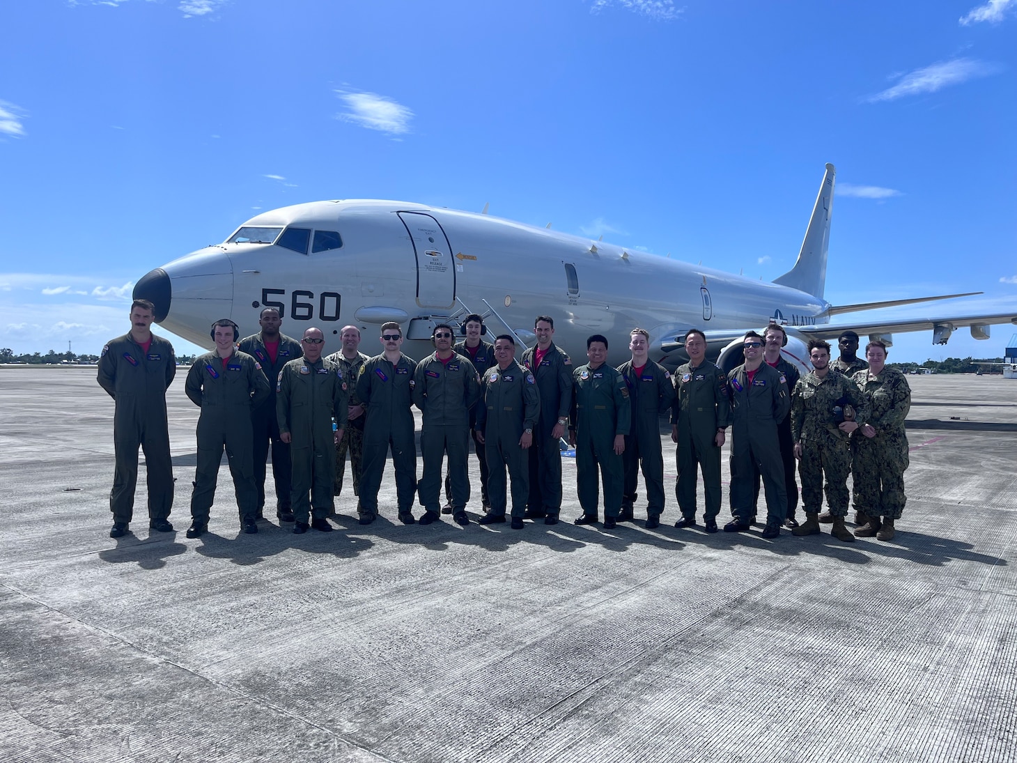 Sailors assigned to the “Red Lancers” of Patrol Squadron (VP) 10 pose for a photo with Maj. Gen. Joannis Leonardi B. Dimaano, commander, Air Mobility Command (center), before taking him on a flight as part of a weeklong engagement promoting joint regional security and partnerships out of Mactan, Philippines. VP-10 is based in Jacksonville, Florida and is currently operating from Kadena Air Base in Okinawa, Japan. It conducts maritime patrol and reconnaissance, as well as theater outreach operations, as part of a rotational deployment to the U.S. 7th Fleet area of operations. (U.S. Navy photo by Lt. j.g. Travis Goebel)