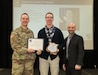 Photo of Christopher Sheerer (middle), Depot Commander Col. Daniel L. Horn (left) and Deputy Commander Robert Lantka (right).