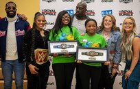 WWE Superstars recognize two JBSA Boys and Girls Club of America members