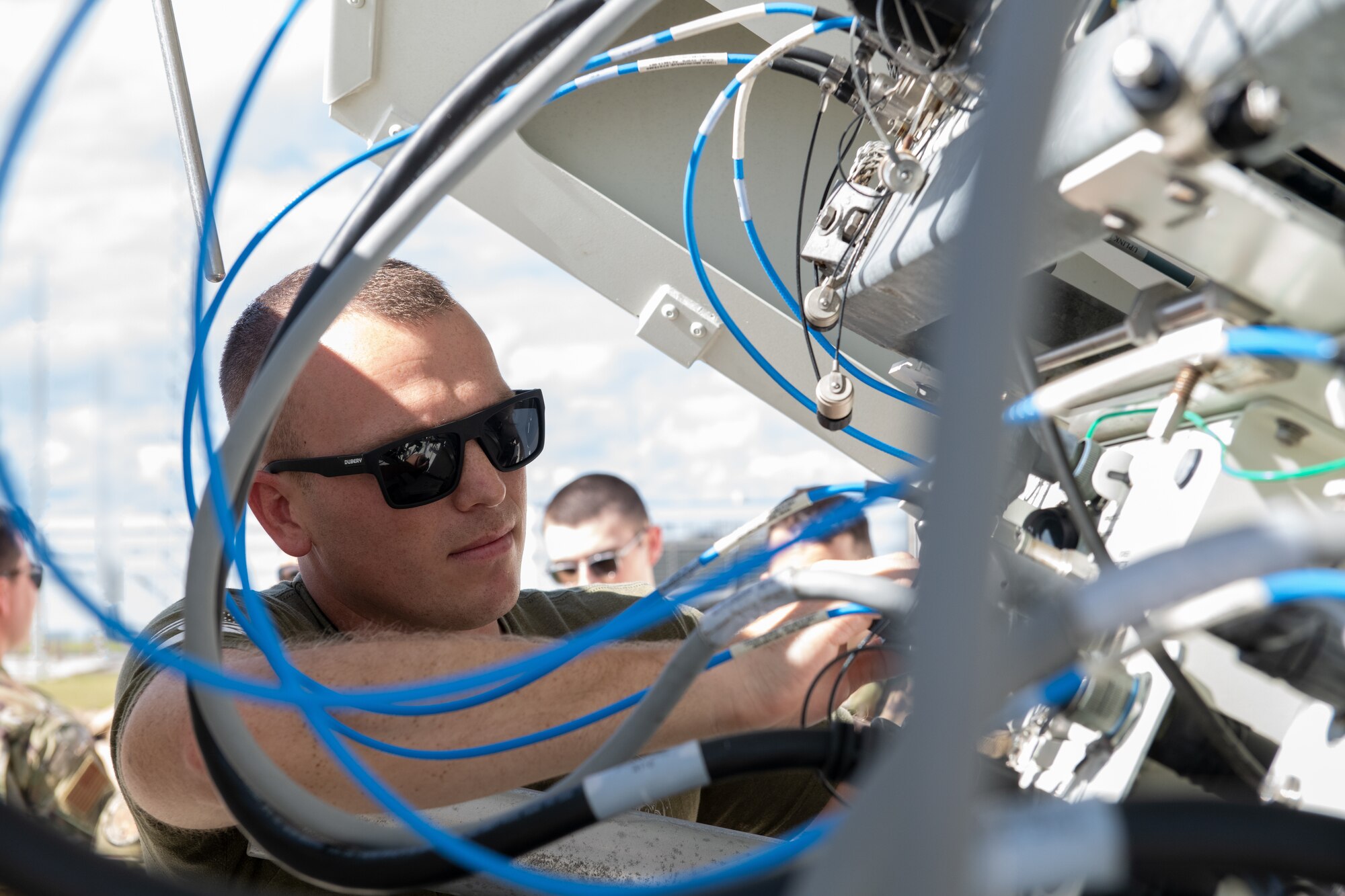 Members of the 114th Electromagnetic Warfare Squadron, Florida Air National Guard, operate on equipment at Cape Canaveral Space Force Station Jan. 8, 2023. The unit's federal mission is to deliver offensive counterspace and space situational awareness to rapidly achieve flexible and versatile effects in support of global and theater campaigns and provide mission-ready Citizen-Airmen and equipment to combatant commanders in support of operations worldwide.