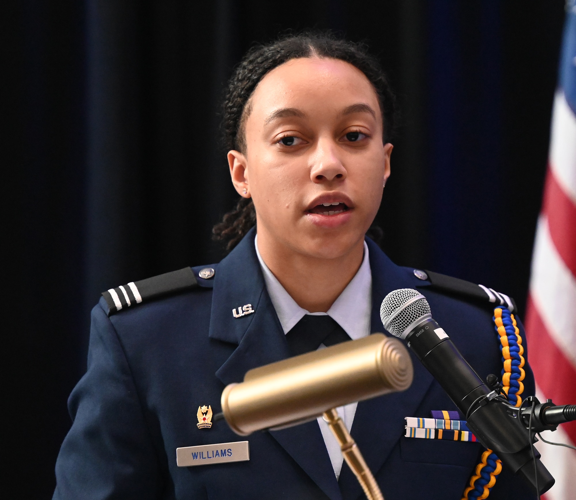 Cadet Cayla Williams addresses the audience after receiving the Brig. Gen. Charles E. McGee Leadership Award during a ceremony at the Samuel Riggs IV Alumni Center, University of Maryland, College Park, Md., Jan 27, 2023. The award was presented by Chief of Staff of the Air Force Gen. CQ Brown, Jr..