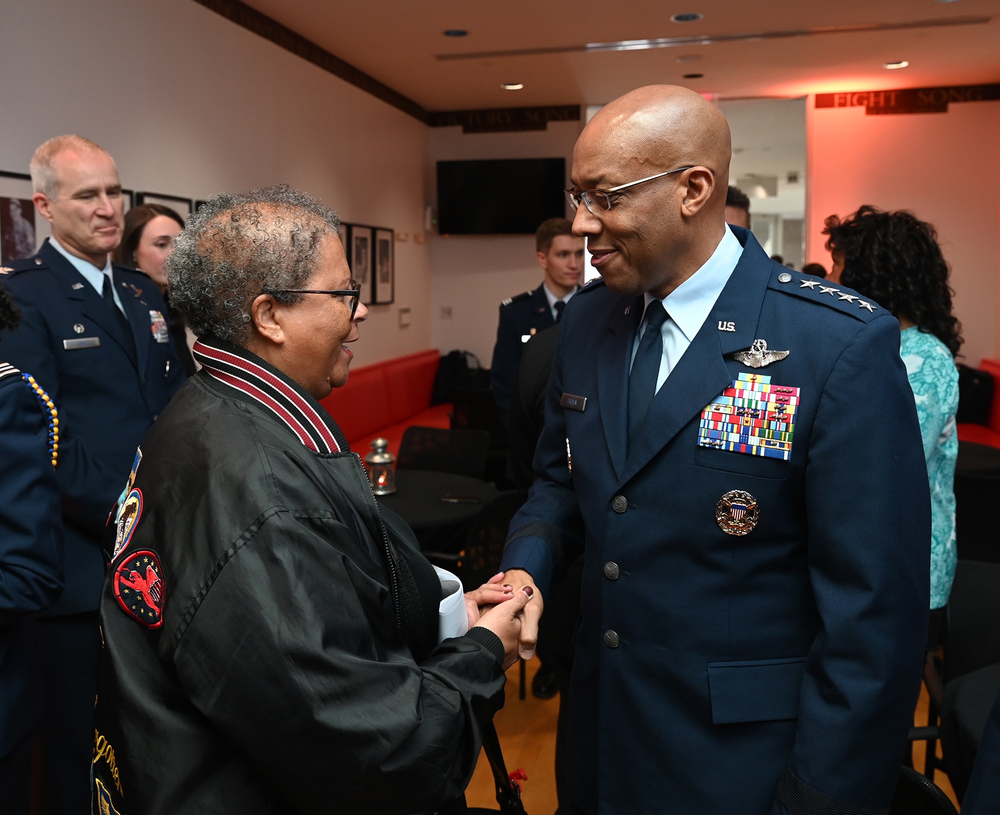 Chief of Staff of the Air Force Gen. CQ Brown, Jr., greets Yvonne McGee, youngest daughter of the late Brig. Gen. Charles McGee, before a ceremony at the Samuel Riggs IV Alumni Center, College Park, Md., Jan 27, 2023. Brown was on hand to award a scholarship named after the late general to a deserving University of Maryland cadet.