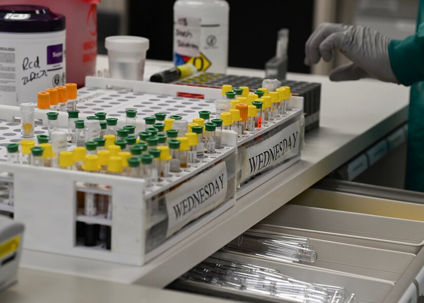 Blood vials line containers prior to testing at the Malcolm Grow Medical Center laboratory at Joint Base Andrews, Md., Jan. 25, 2023.