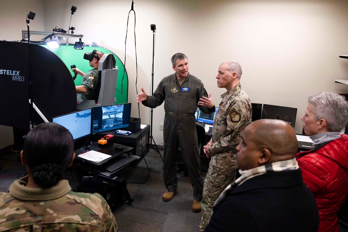 U.S. Air Force Gen. Thomas Bussiere, Air Force Global Strike Command commander, listens to Lt. Col. Warren Carroll, assigned to the 93rd Bomb Squadron (BS), explain the Virtual in-Air Refueling Trainer (VRPT) during a base tour, Barksdale Air Force Base, La., Jan. 26, 2023