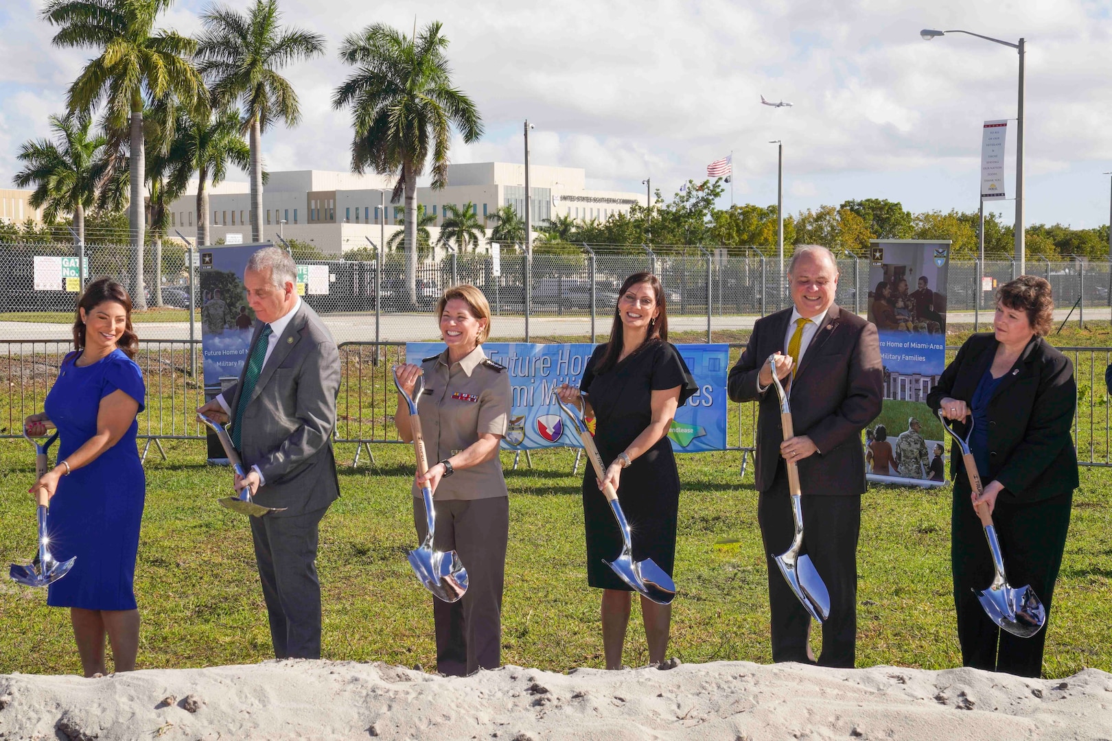 Gen. Laura Richardson, commander of U.S. Southern Command (SOUTHCOM), center, and distinguished guests break ground during a ceremony for the future site of the new military housing complex supporting SOUTHCOM's service members and their families.