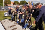 Gen. Laura Richardson, commander of U.S. Southern Command (SOUTHCOM), center, and distinguished guests break ground during a ceremony for the future site of the new military housing complex supporting SOUTHCOM's service members and their families.