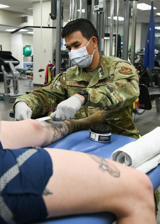 A 316th Medical Group Airman uses a blade tool during a physical therapy session at the Malcolm Grow Medical Center at Joint Base Andrews, Md., Jan. 25, 2023.