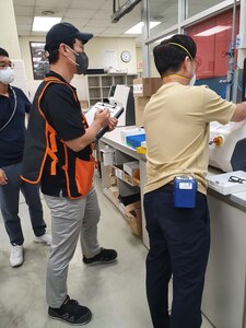 Workers at the U.S. Army Medical Materiel Center-Korea conduct a routine air-quality inspection. USAMMC-K was recently recognized by Army Materiel Command with its Exceptional Organization Safety Award at the battalion level.