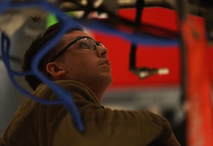 U.S. Air Force Senior Airman Zachary Knighton, 9th Maintenance Squadron aerospace propulsion technician, inspects a U-2 Dragon Lady motor Jan. 12, 2023, at Beale Air Force Base, Calif.