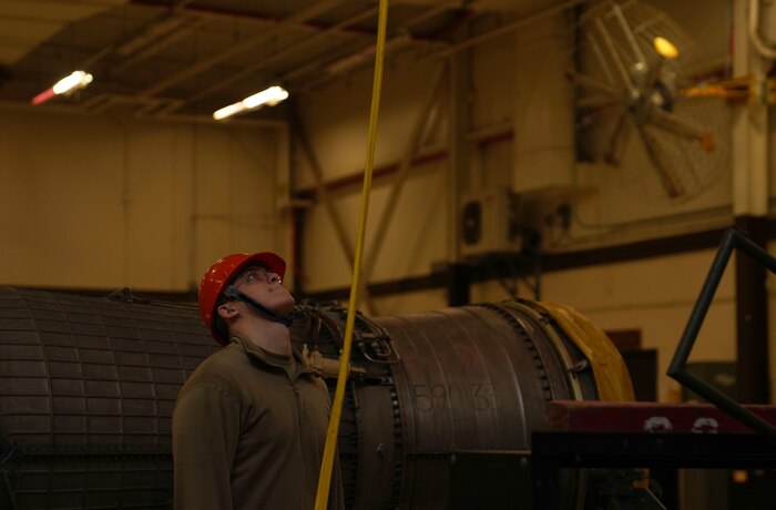 U.S. Air Force Senior Airman Liam Boudreault, 9th Maintenance Squadron aerospace propulsion technician, conducts a hoist inspection Jan. 12, 2023, at Beale Air Force Base, Calif.