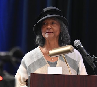 Mrs. Charlene McGee-Smith, daughter of the late Brig. Gen. Charles McGee, addresses the audience at a ceremony hosted by Chief of Staff of the Air Force Gen. CQ Brown, Jr., at the Samuel Riggs IV Alumni Center, College Park, Md., Jan 27, 2023. Brown was on hand to award a scholarship named after the late General to a deserving University of Maryland cadet.