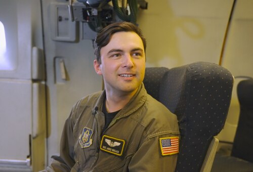 Color photo of Reserve Citizen Airmen, SSgt. Jared Breaux, 70th ARS, seated before lifting off on a KC-10A Extender aircraft.