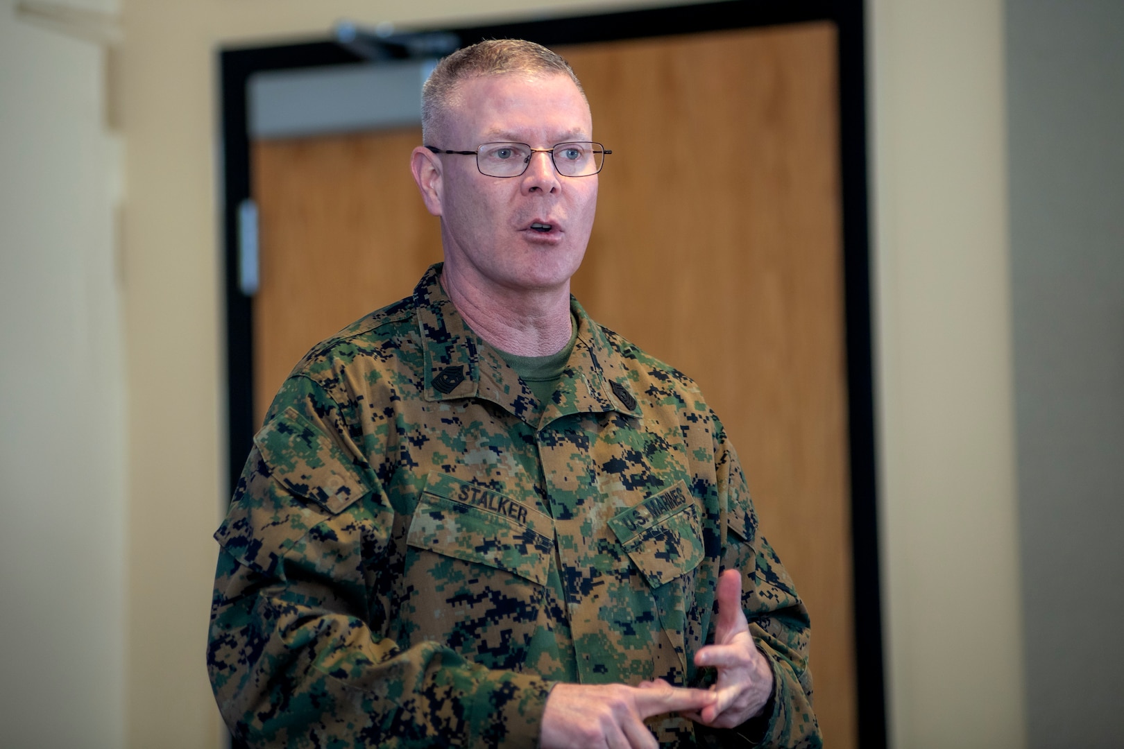 Marine in uniform speaking