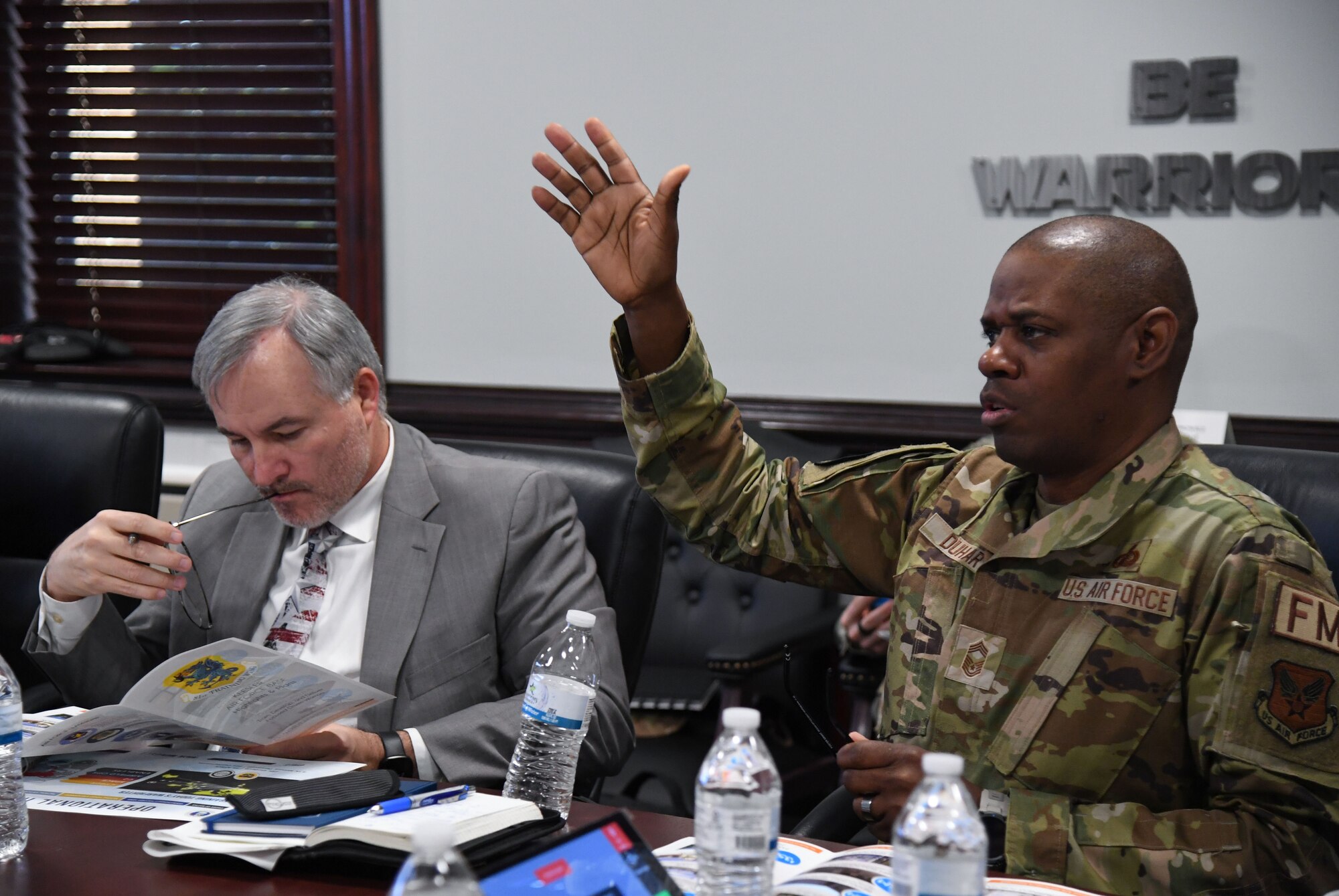 U.S. Air Force Chief Master Sgt. Kaci Duhart, Assistant Secretary of the Air Force executive for enlisted matters, attends a wing mission brief inside the 81st Training Wing headquarters building at Keesler Air Force Base, Mississippi, Jan. 27, 2023.