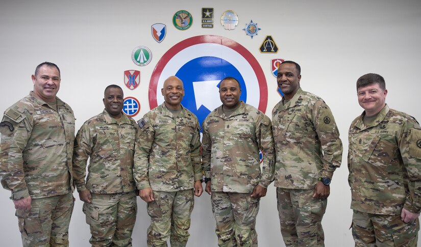 Maj. Gen. Michel M. Russell Sr., commanding general, 1st Theater Sustainment Command, Maj. Gen. David Wilson, commanding general, Army Sustainment Command, Maj. Gen. Gavin Lawrence, commanding general, Military Surface Deployment and Distribution Command, and their Command Sgts. Maj. stand for a group photo during a leader professional development conference at Camp Arifjan, Kuwait on Jan. 24, 2023.