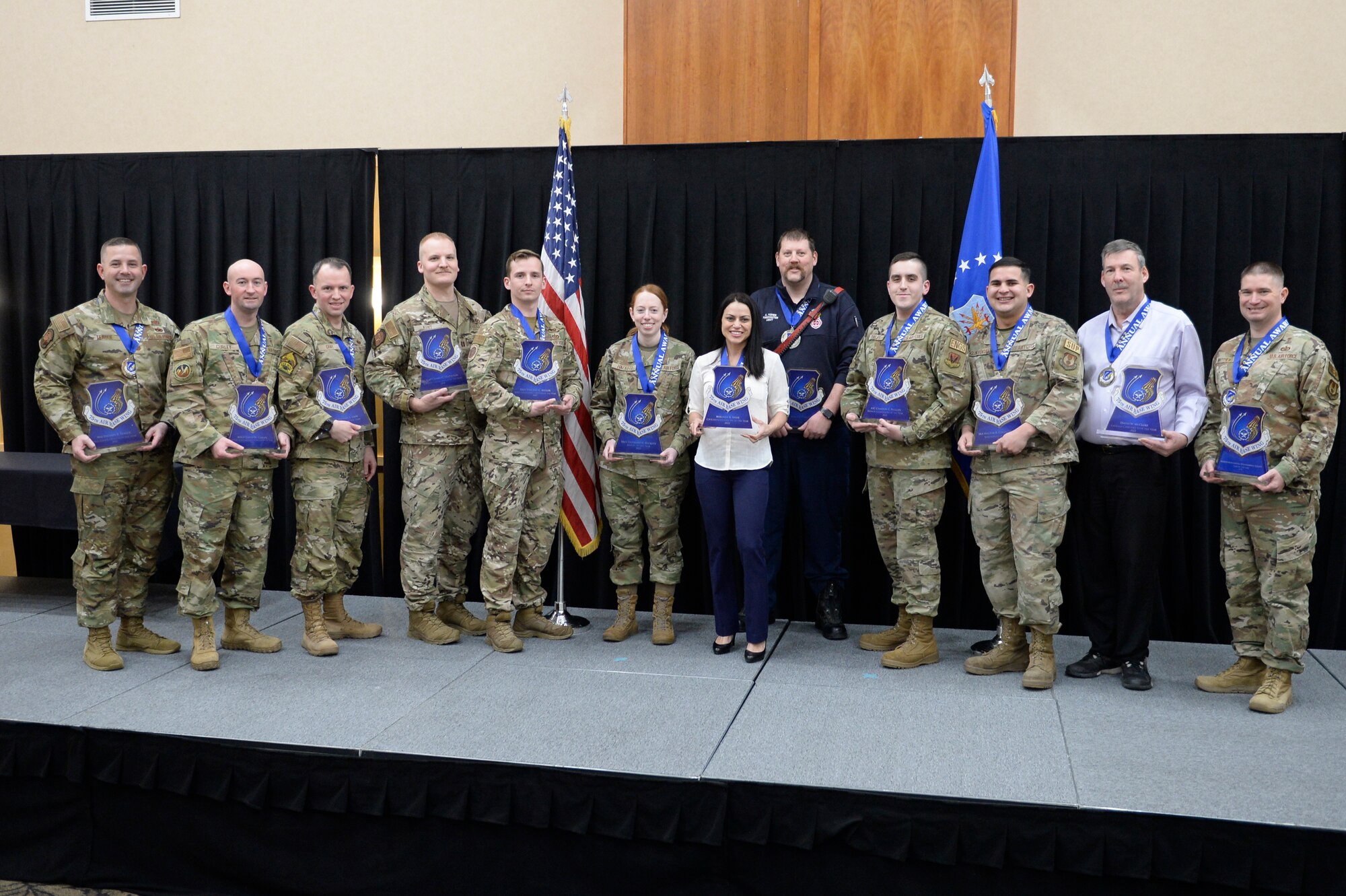 Annual award winners for the 75th Air Base Wing during a celebration event at Hill Air Force Base, Utah, Jan. 27, 2023. The awards serve to recognize the wing's service members and civilians for exceptional performance over the past year. (U.S. Air Force photo by David A. Perry)