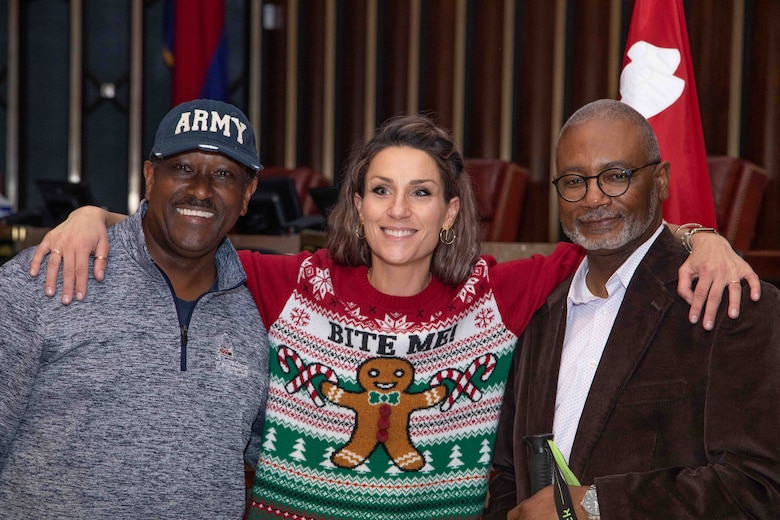 Public Affairs Specialist Jessica Haas (center) with her teammates, VI Specialist Vance Harris (left) and Public Affairs Chief Ken Williams (right) at the 2022 End of the Year Town Hall. 

Haas is the principal writer in the Public Affairs Office. She writes about everything from the Memphis District reaching important project milestones to the Dredge Hurley crew out working during the cold Christmas Holidays. She is also our extraordinary website and social media manager who has the Memphis District positioned number one in MVD for the most followers. 

You would expect all that’s been mentioned about what Jessica does is hard work and it is. However, if you ask her about it, you’ll get a different perspective. 

"I'm the lucky one here," Haas explains. "When you love what you do, it isn’t work anymore. It’s an honor to be around and interact with such a talented team of professionals every day. If this is a dream, I never want to wake up."