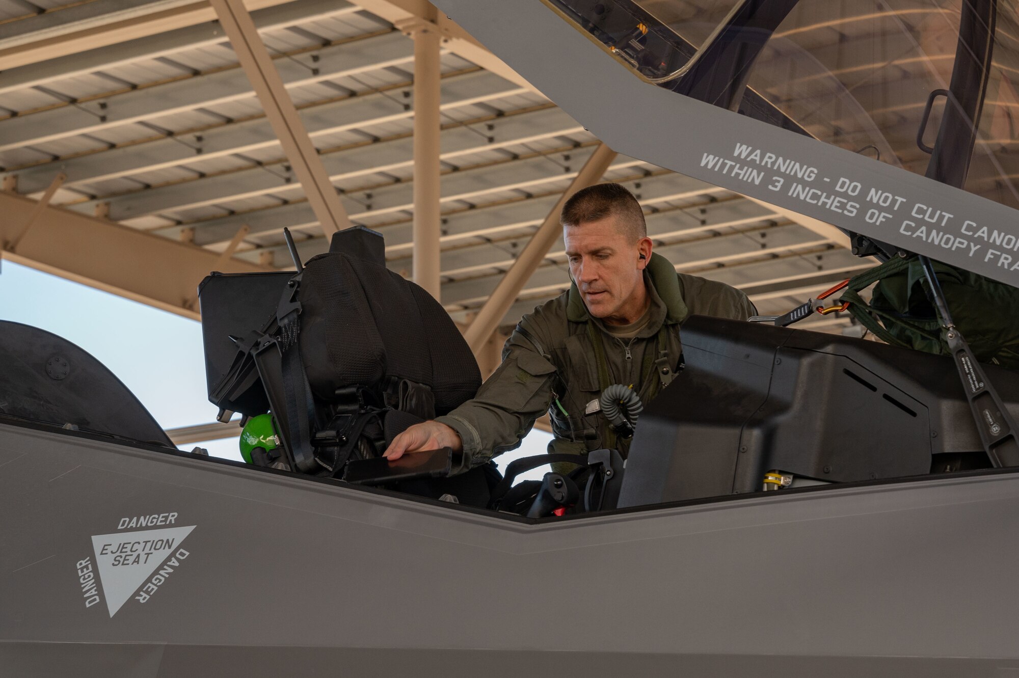 Brig. Gen. Michael Rawls, Air Force Operational Test and Evaluation Center commander, performs a pre-flight check on an F-35A Lightning II at Nellis Air Force Base, Nevada, Jan. 12, 2023. Brig. Gen. Rawls is the first general officer to be certified as a fifth-generation aggressor pilot. (U.S. Air Force photo by Airman 1st Class Jordan McCoy)