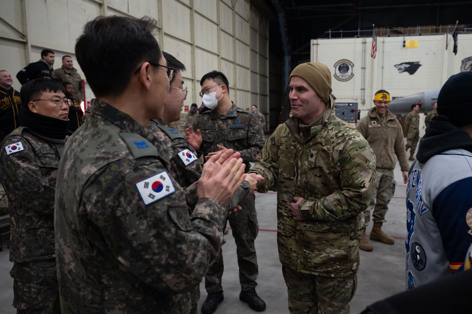 8th Fighter Wing leadership shake hands with Republic of Korea Air Force 38th Fighter Group leaders.