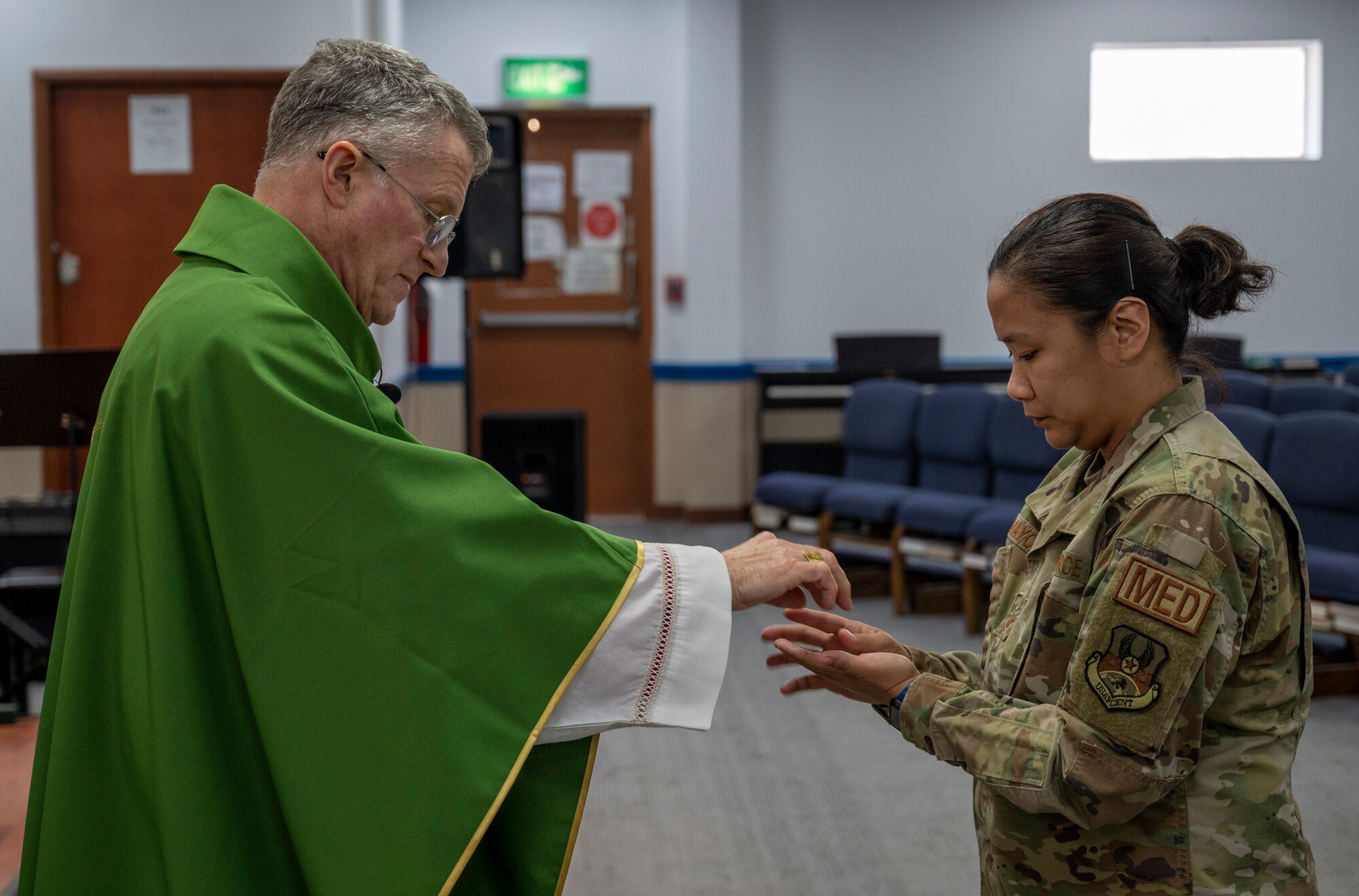 Archbishop Timothy Broglio, Archdiocese Military Services, gives Communion at Ali Al Salem Air Base, Kuwait, Jan. 30, 2023.
