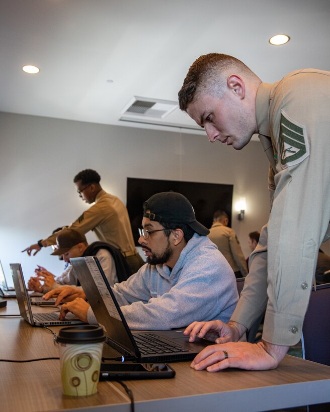 U.S. Marines with Marine Corps Individual Reserve Support Activity, Force Headquarters Group, Marine Forces Reserve, assists Marines in the Individual Ready Reserve (IRR) during the admin audit process of an IRR Muster, Manhattan Beach, California, Jan. 21, 2023. Marines that take part in the IRR Muster are screened in order to ensure readiness for augmentation into the active component of the total force. The IRR Marines were required to attend a reserves opportunity and obligations brief as well as complete an admin audit in order to ensure their information is up to date in the case of receiving recall orders. (U.S. Marine Corps photo by Cpl. Jonathan L. Gonzalez)