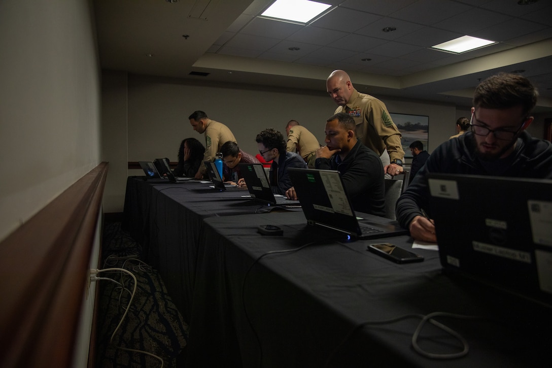 U.S. Marines with Marine Corps Individual Reserve Support Activity, Force Headquarters Group, Marine Forces Reserve, assist Marines in the Individual Ready Reserve (IRR) during the admin audit process of an IRR Muster, Tampa, Florida, Jan. 28, 2023. Marines that take part in the IRR Muster are screened in order to ensure readiness for augmentation into the active component of the total force. The IRR Marines were required to attend a reserves opportunity and obligations brief as well as complete an admin audit in order to ensure their information is up to date in the case of receiving recall orders. (U.S. Marine Corps photo by Lance Cpl. David Intriago)