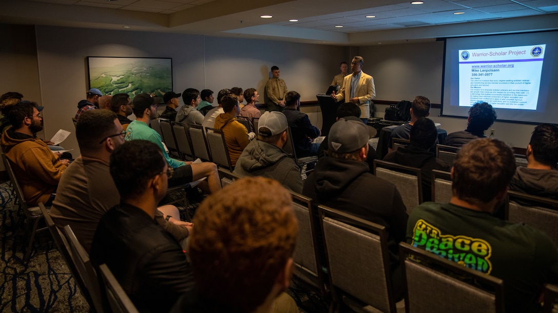 Mike Lanpolsaen, a military and veteran organizations outreach manager, with the Warrior Scholar Project, presents college readiness opportunities to Marines at an Individual Ready Reserve Muster in Tampa, Florida, Jan. 28, 2023. The Warrior Scholar Project provides enlisted veterans and transitioning service members with a skill bridge that enables a prepared transition into the college classroom environment. A Marine that applies to the Warrior Scholar Project is expected to participate in a complimentary one or two week college preparatory boot camp at a tier 1 university. Lanpolsaen is a native of Daytona Beach, Florida. (U.S. Marine Corps photo by Lance Cpl. David Intriago)