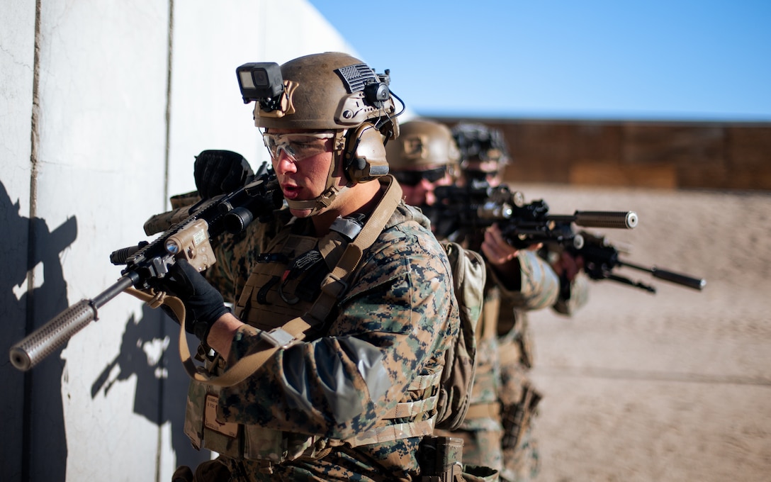 U.S. Marines with 3rd Littoral Combat Team, 3d Marine Littoral Regiment, 3d Marine Division, prepare to clear a compound during a demolition urban operations range as part of Marine Littoral Regiment Training Exercise at Marine Corps Air Ground Combat Center Twentynine Palms, California, Jan. 28, 2023. MLR-TE is a large-scale, service-level exercise designed to train, develop, and experiment with the 3rd MLR as part of a Marine Air-Ground Task Force, led by 3rd Marine Division, operating as a Stand-in Force across a contested and distributed maritime environment.