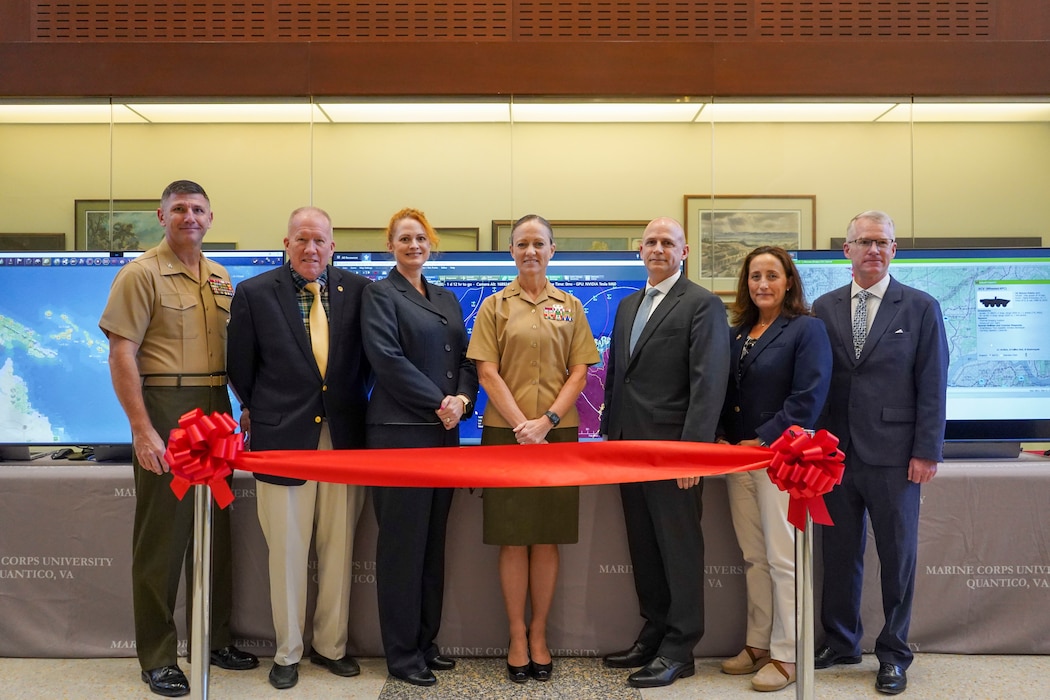 U.S. Marine Corps BGen Maura Hennigan, Marine Corps University President, and the directors of MCU, pose for a photo during the MCU Wargaming Cloud ribbon cutting ceremony at Warner Hall on Marine Corps Base Quantico, Virginia, September 23, 2022.