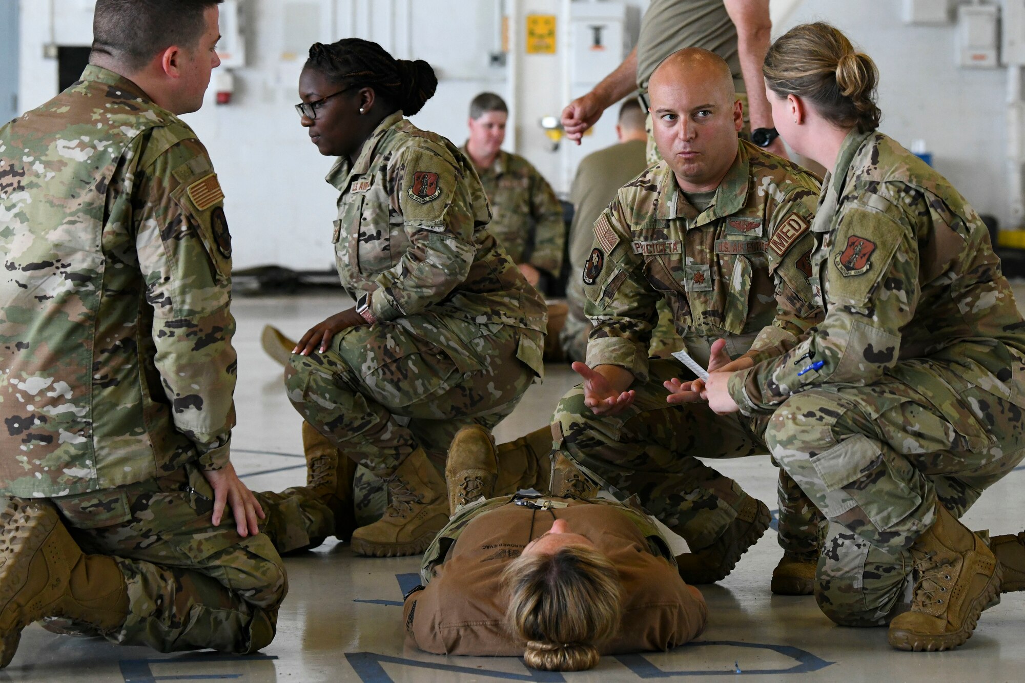Airmen assigned to the 183rd Aeromedical Evacuation Squadron participate in a mass-casualty training exercise at MacDill Air Force Base, June 19. The Airmen completed their annual training, where they honed their skills in patient care. (U.S. Air National Guard photo by 1st Lt. Kiara N. Spann)